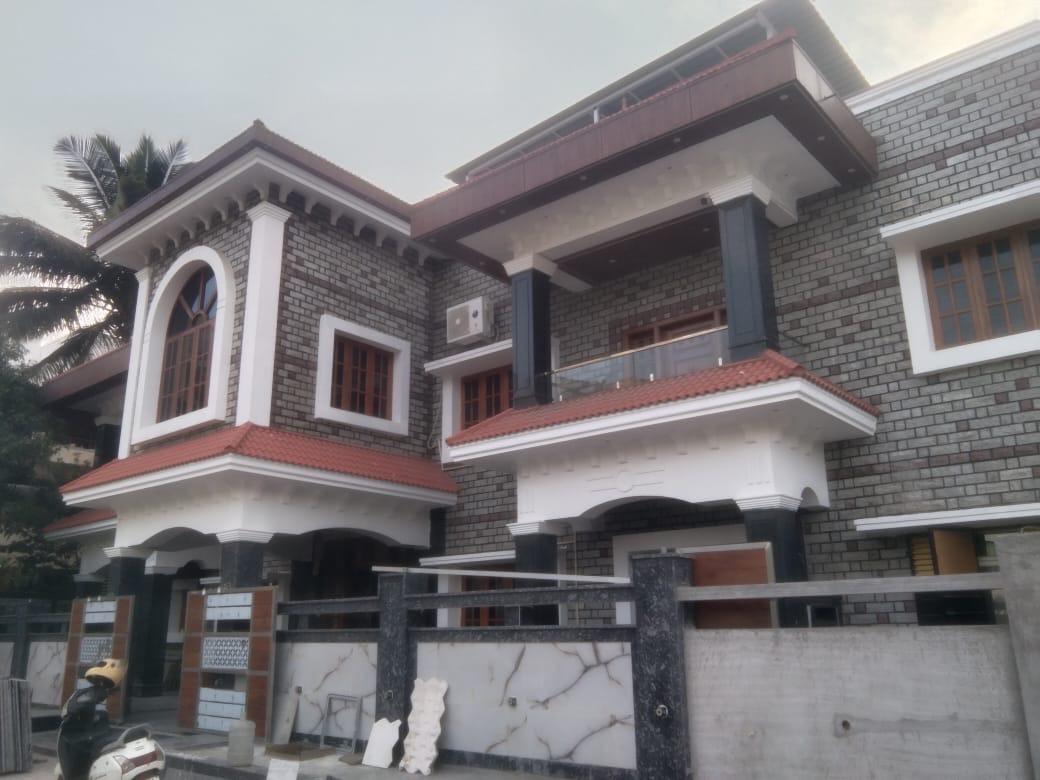 Completed PaintDWall exterior house painting project