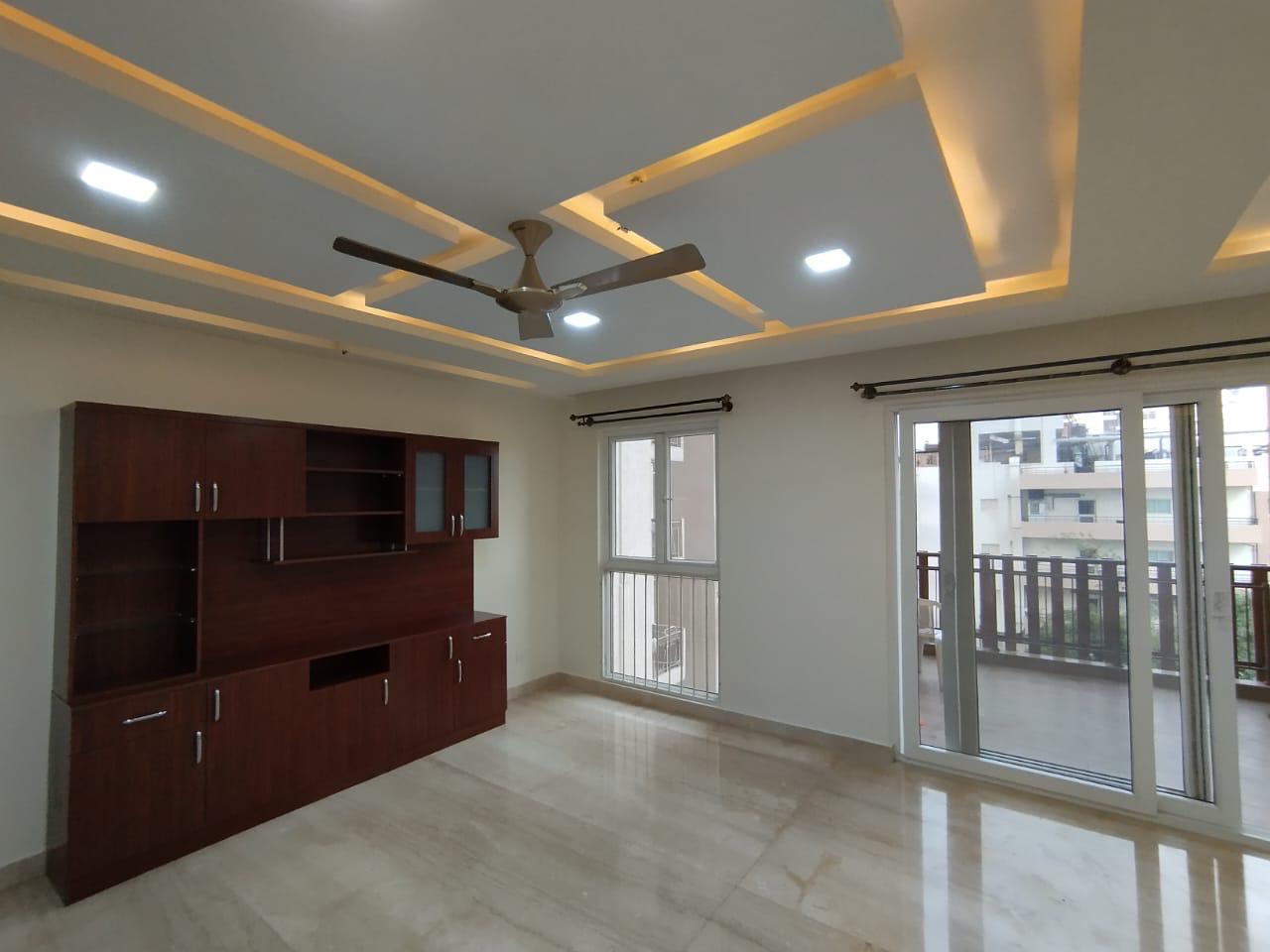 Completed interior painting project with finished living room and ceiling